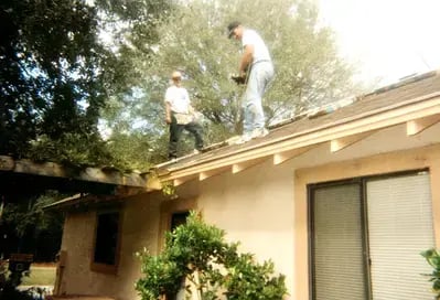 Ed Valantine working on roof