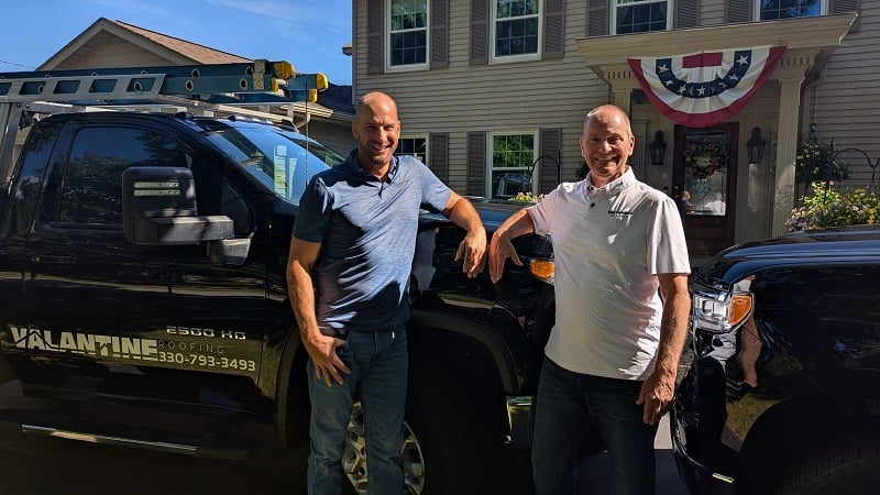 Ed and Chris from Valantine Roofing standing with company truck in Mahoning Valley