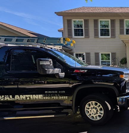 Ed and Chris Center with trucks